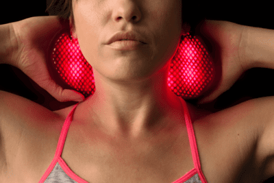 jazz band live red light therapy behind female neck