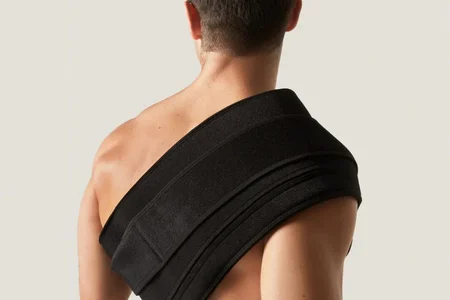 Man with Nushape Therapy Wrap on his Shoulder