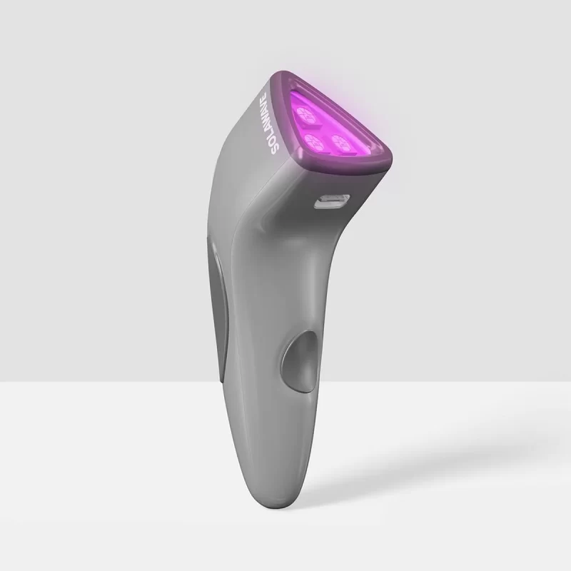 This red light therapy device outputs blue, red, and infrared, and is a handheld design
