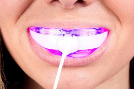 Improve Your Dental Hygiene with the Healing Power of Red and Blue Light Therapy for Teeth